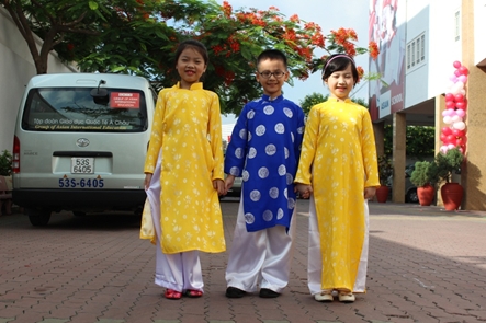 Lovely students of primary level in traditional costumes before show time