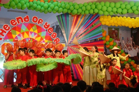 Students in Grade 4 singing and dancing a folk song